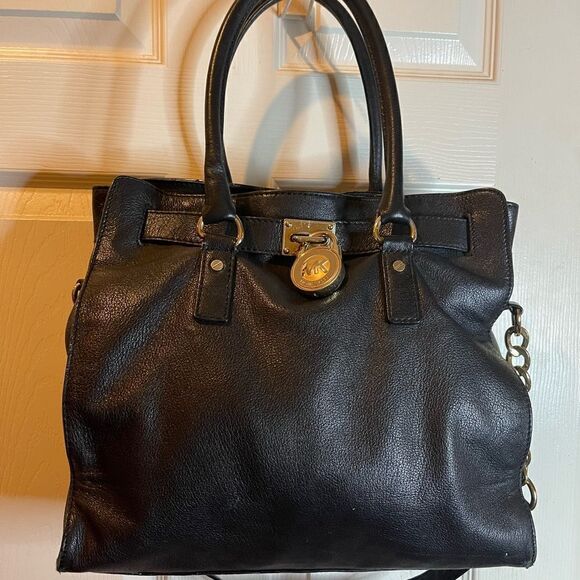 Michael Kors black leather large shoulder bag with gold tone accents. - Picture 2 of 14